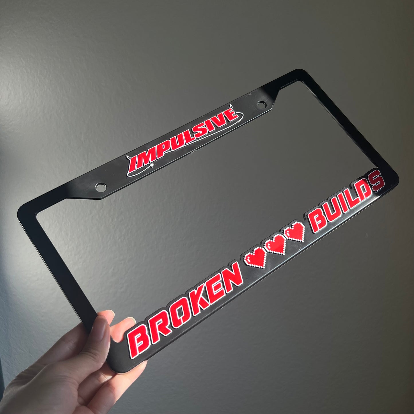 Broken Builds License Plate Frame