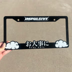 Multiple Japanese anime inspired plastic custom License Plate Frame. Top has Impulsive logo and the bottom has japanese characters and english translated to stay safe surrounding with japanese clouds. Asian inspired. Black Frame with White lettering.