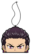 Load image into Gallery viewer, Anime Reyna Anime Character Air Freshener. Purple slick back hair with purple eyes and gold cuff earrings. Angry japanese air freshener hanging from black string.
