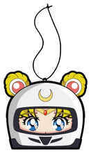 Load image into Gallery viewer, Moon Japanese Anime Character air freshener hanging from black string. Wearing white helmet with yellow moon crescent logo on blue eyed anime girl. blonde spacebuns.
