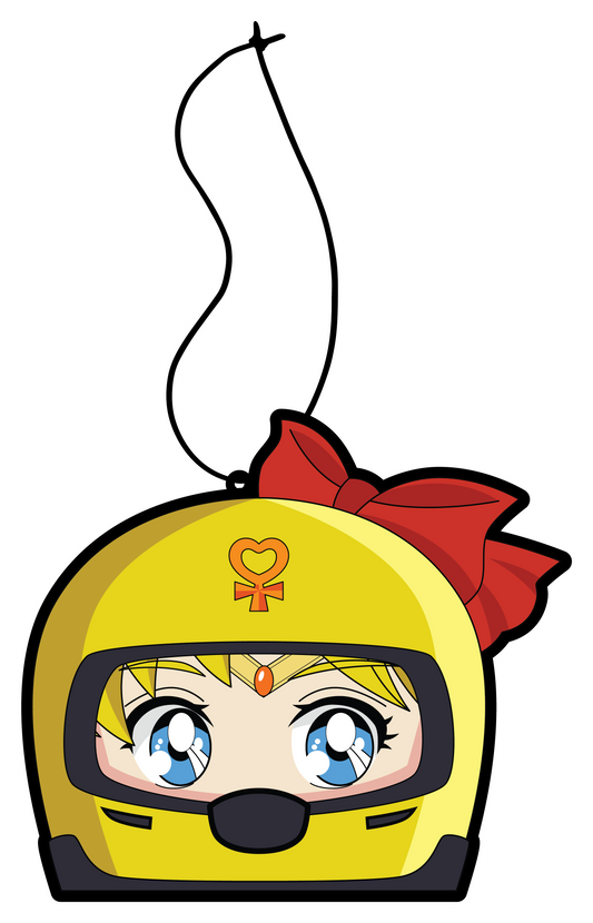 Venus air freshener hanging from black string. Japanese anime character blonde hair blue eyes wearing yellow helmet with pendent logo and red bow.
