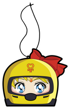 Load image into Gallery viewer, Venus air freshener hanging from black string. Japanese anime character blonde hair blue eyes wearing yellow helmet with pendent logo and red bow.
